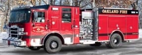 Oakland Fire Department Pierce Enforcer Type I engine in profile.